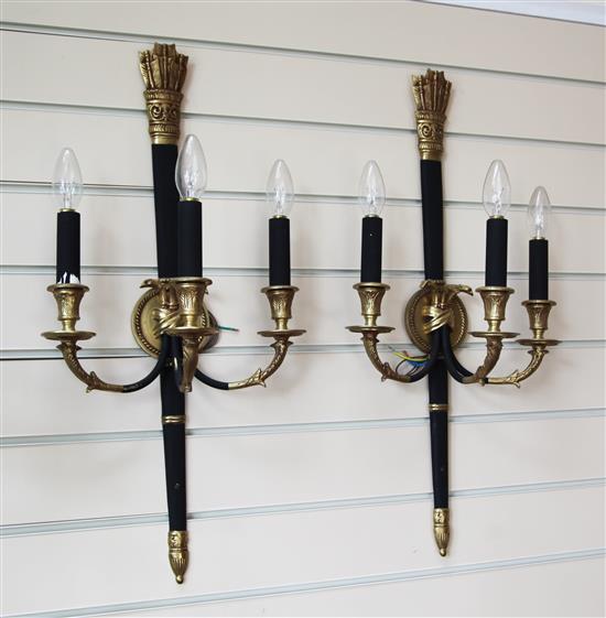 An Empire style brass and bronzed eight light chandelier plus two lights